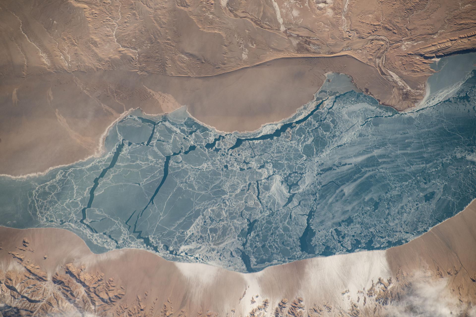 An icy lake in southwestern China's high plateau region north of the Himalayas is pictured from the International Space Station as it orbited 262 miles above the Asian continent.