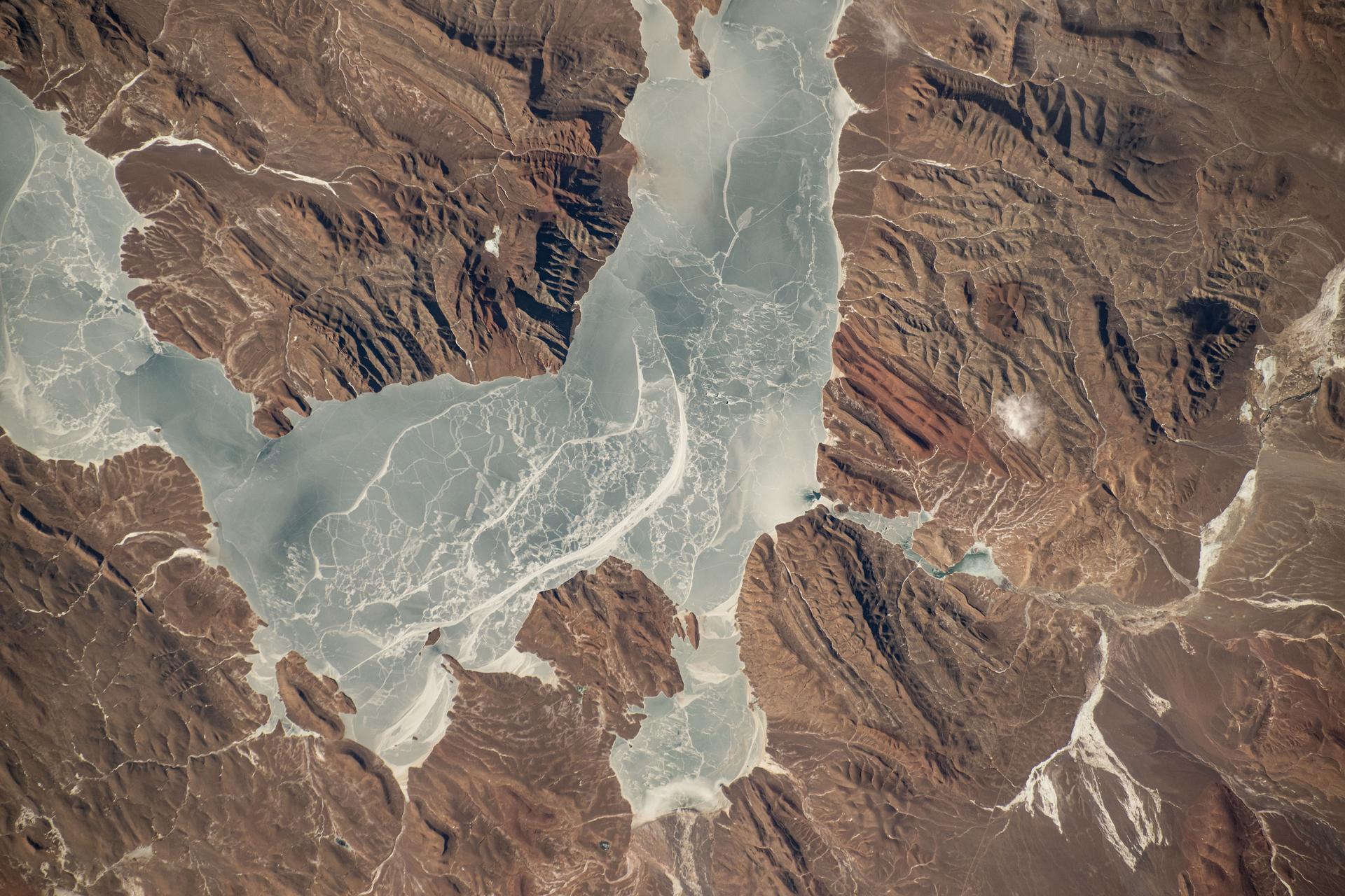 An icy lake in southwestern China's high plateau region north of the Himalayas is pictured from the International Space Station as it orbited 262 miles above the Asian continent.