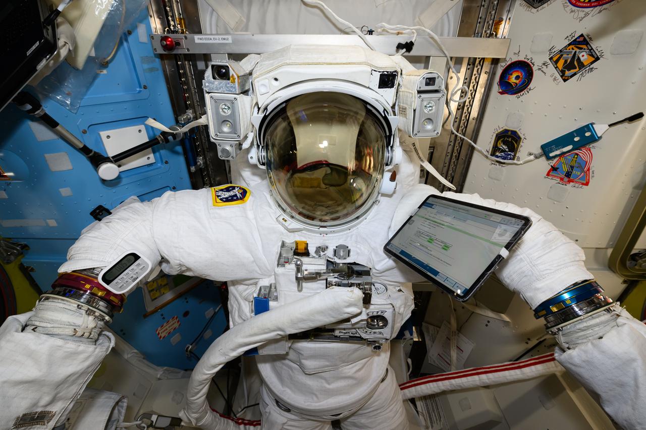 iss072e363875 (Dec. 9, 2024) ---A U.S. spacesuit is pictured being serviced for maintenance inside the International Space Station's Quest airlock.
