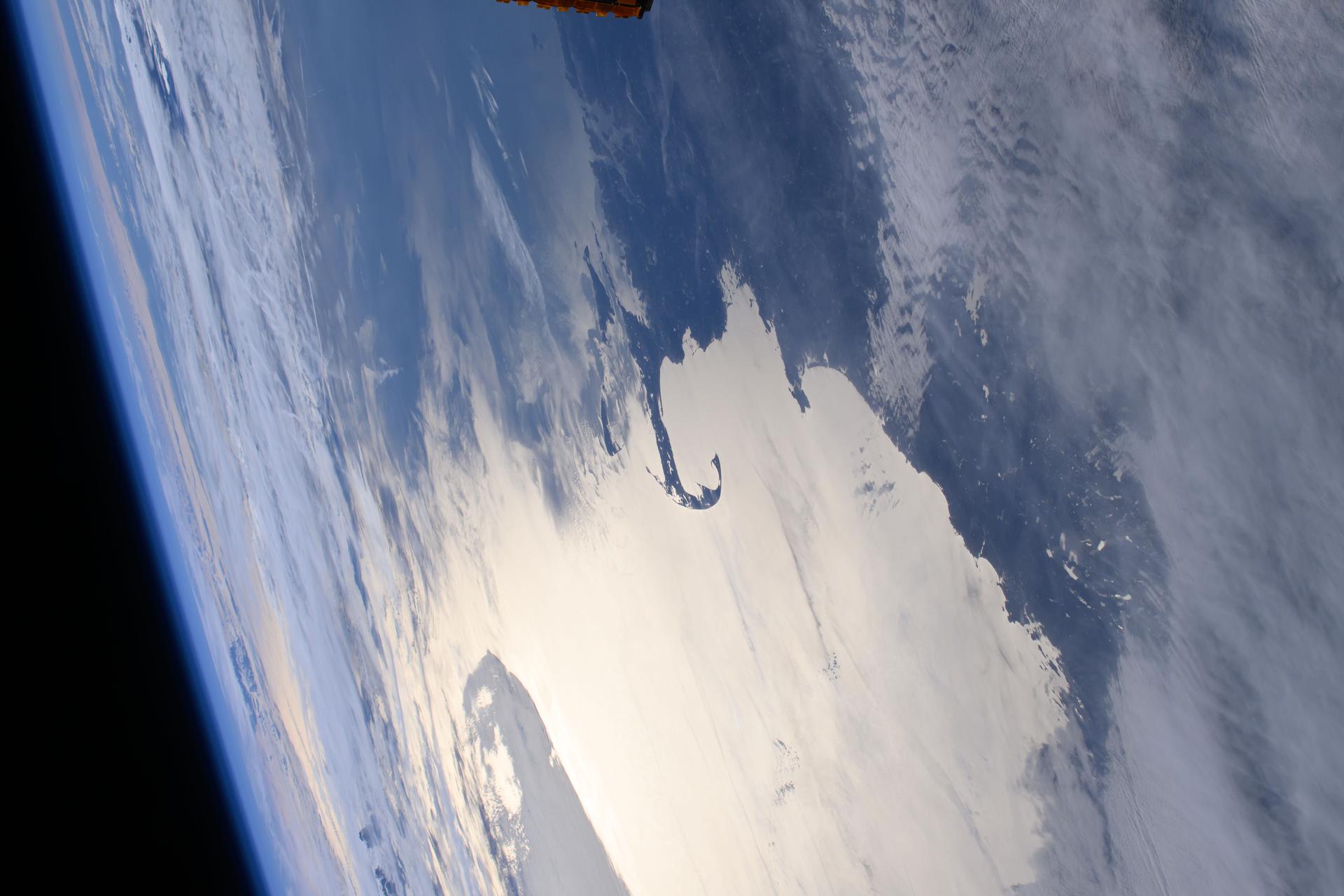 The gleaming New England coast from Massachusetts to Maine is pictured from the International Space Station as it orbited 262 miles above Quebec, Canada.