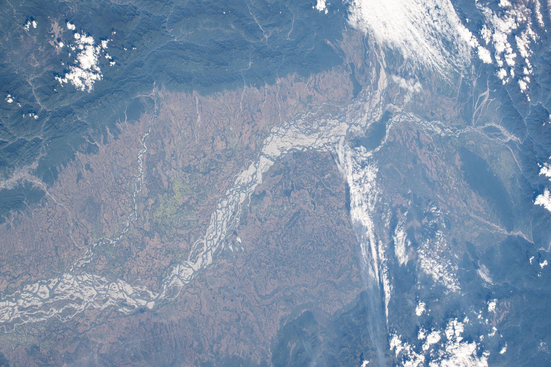 The Brahmaputra River, in eastern India at the foot of the Himalayas near China, is pictured from the International Space Station as it orbited 261 miles above.