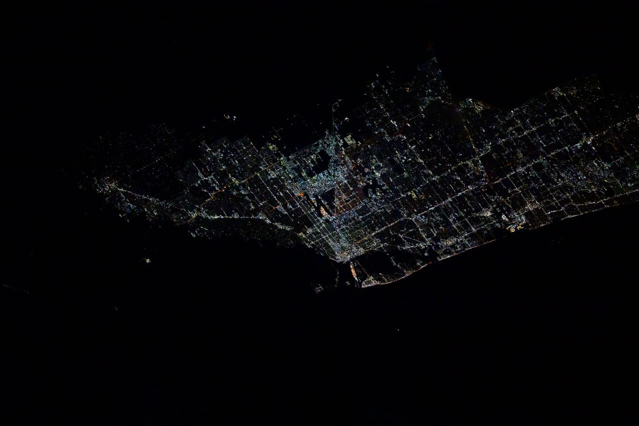 iss072e399013 (Dec. 19, 2024) --- The city lights of Miami, Florida, the seat of Miami-Dade County with a population of about 456,000 citizens, and its surrounding suburbs are pictured at approximately 4:07 a.m. local time from the International Space Station as it orbited 256 miles above the Atlantic Ocean.