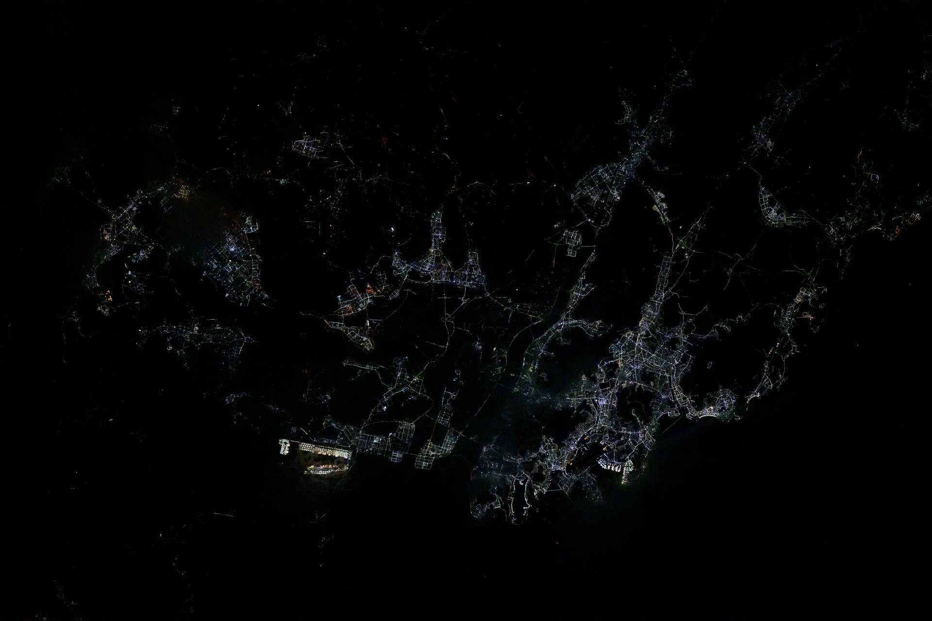The city lights of Busan, South Korea, a port city with a population of over 3.3 million on the Korean Strait, are pictured at approximately 4:19 a.m. local time from the International Space Station as it orbited 257 miles above.