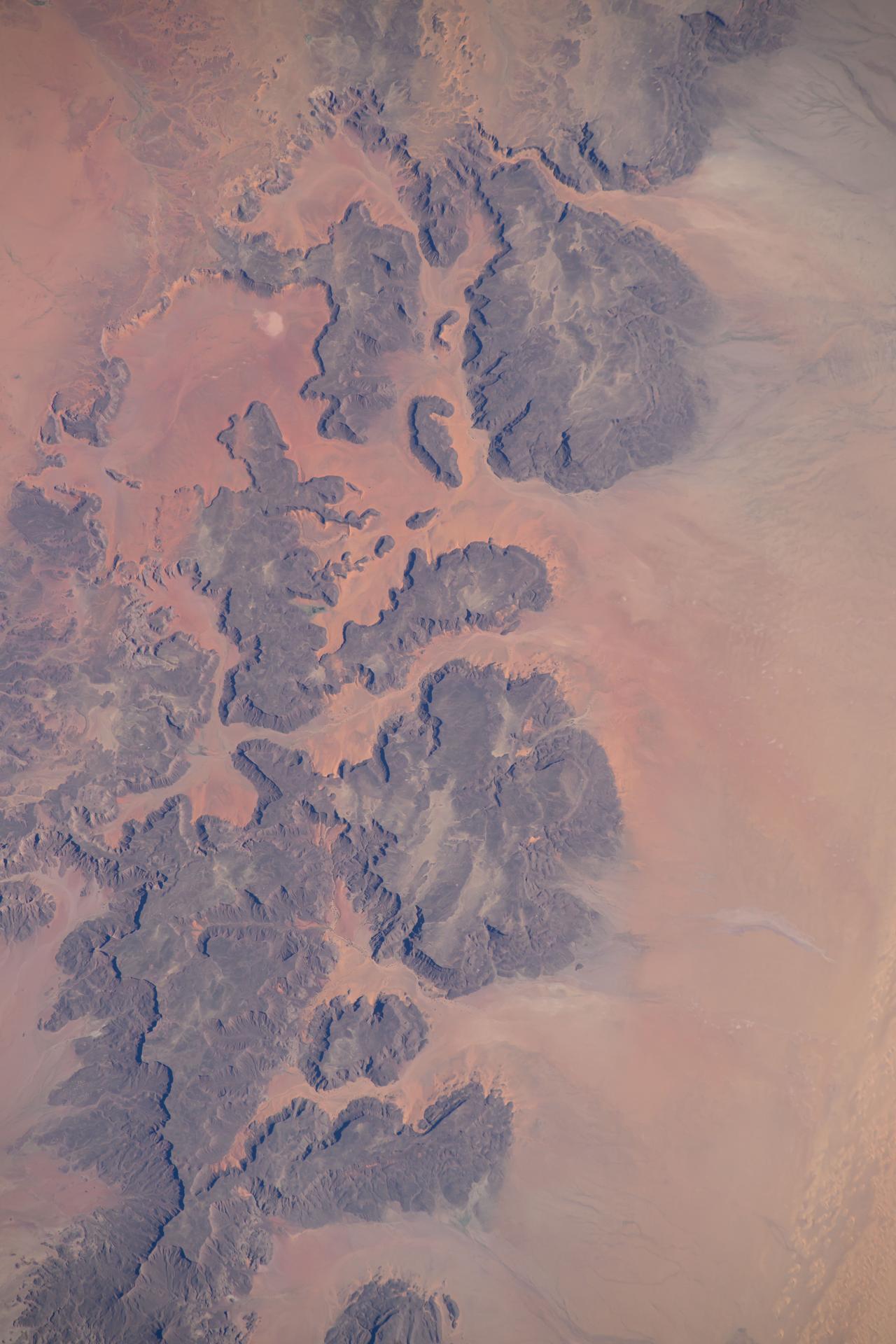 A portion of the Ennedi Massif in Northern Chad, a UNESCO World Heritage Site in the Sahara, is pictured from the International Space Station as it orbited 261 miles above the African nation.
