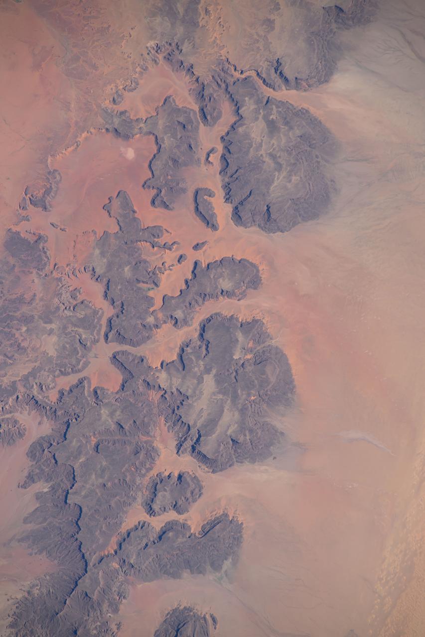 iss072e404551 (Dec. 26, 2024) --- A portion of the Ennedi Massif in Northern Chad, a UNESCO World Heritage Site in the Sahara, is pictured from the International Space Station as it orbited 261 miles above the African nation.