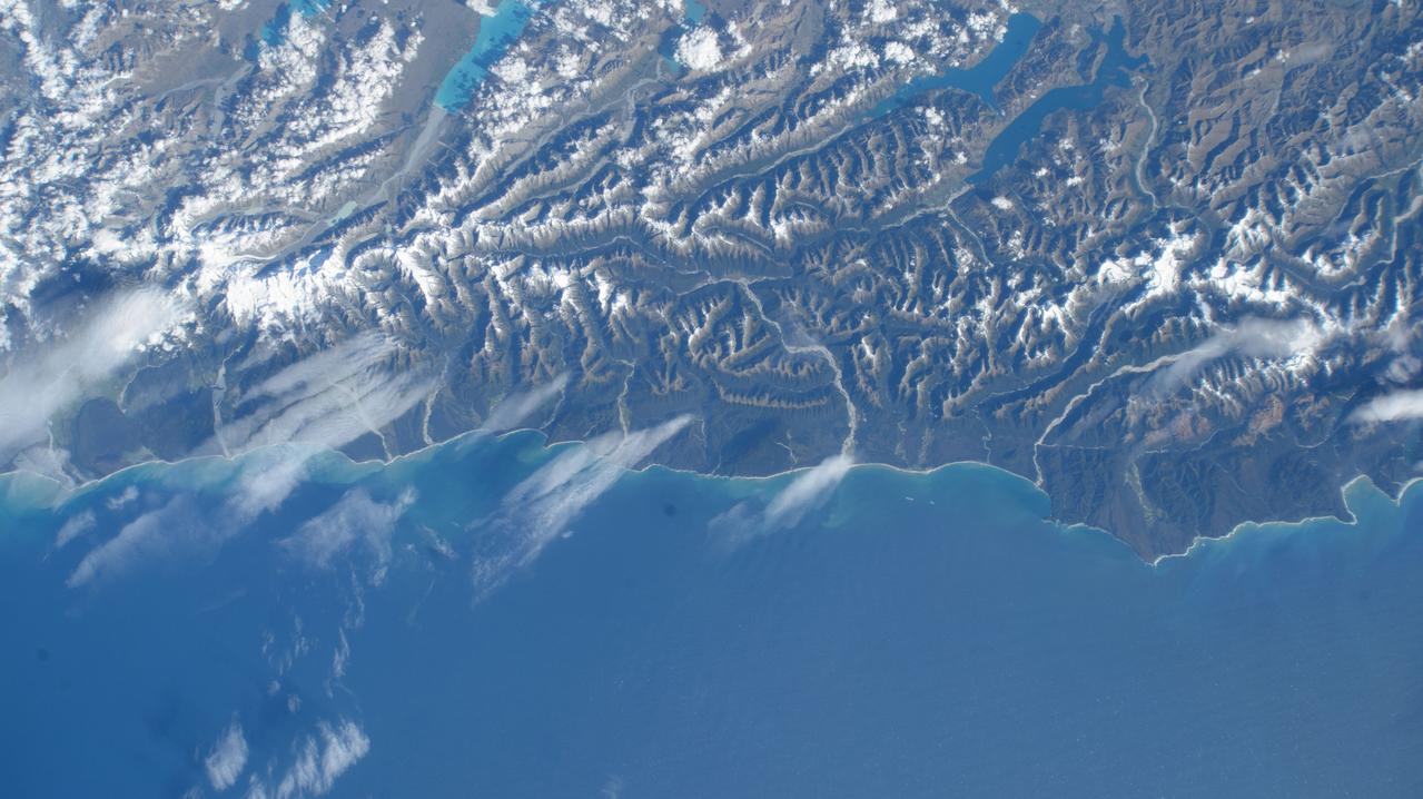 iss072e424419 (Jan. 4, 2025) --- The Tasman Sea coast on New Zealand's South Island, with Mount Aspiring National Park in the Southern Alps, is pictured from the International Space Station as it orbited 267 miles above.