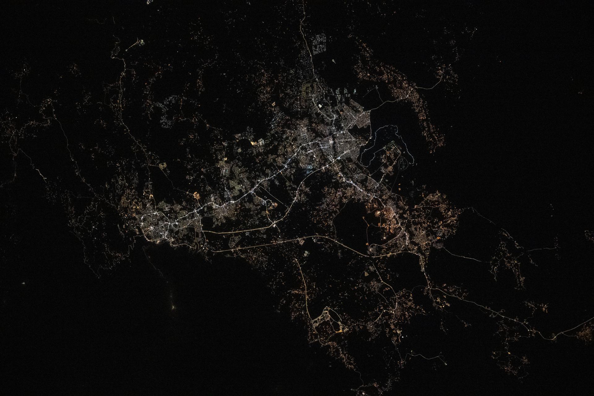 City lights illuminate this triangular area comprising the cities of Abha, Khamis Mushait, and Ahad Rafidah, with a total metropolitan population of about 2.5 million residents in southwestern Saudi Arabia. The International Space Station was orbiting 256 miles above the Arabian Peninsula at approximately 11:28 p.m. local time.
