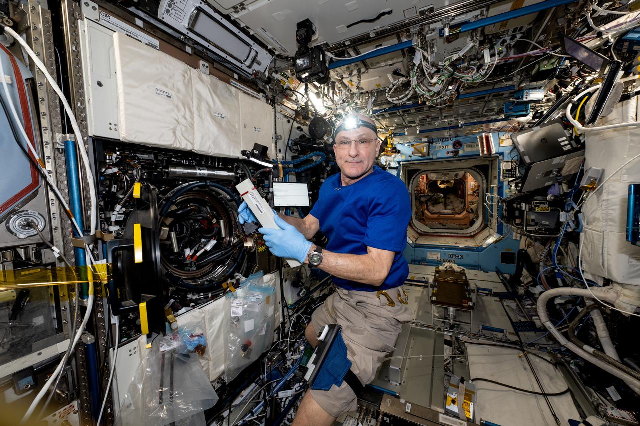 iss072e451296 (Jan. 8, 2025) --- NASA astronaut and Expedition 72 Flight Engineer Don Pettit works in the Destiny laboratory module's Combustion Integrated Rack swapping samples of materials to observe how they burn in weightlessness. The investigation taking place inside the International Space Station's CIR enables the safe observation of flames and how they spread in microgravity potentially improving fire safety on crew missions.
