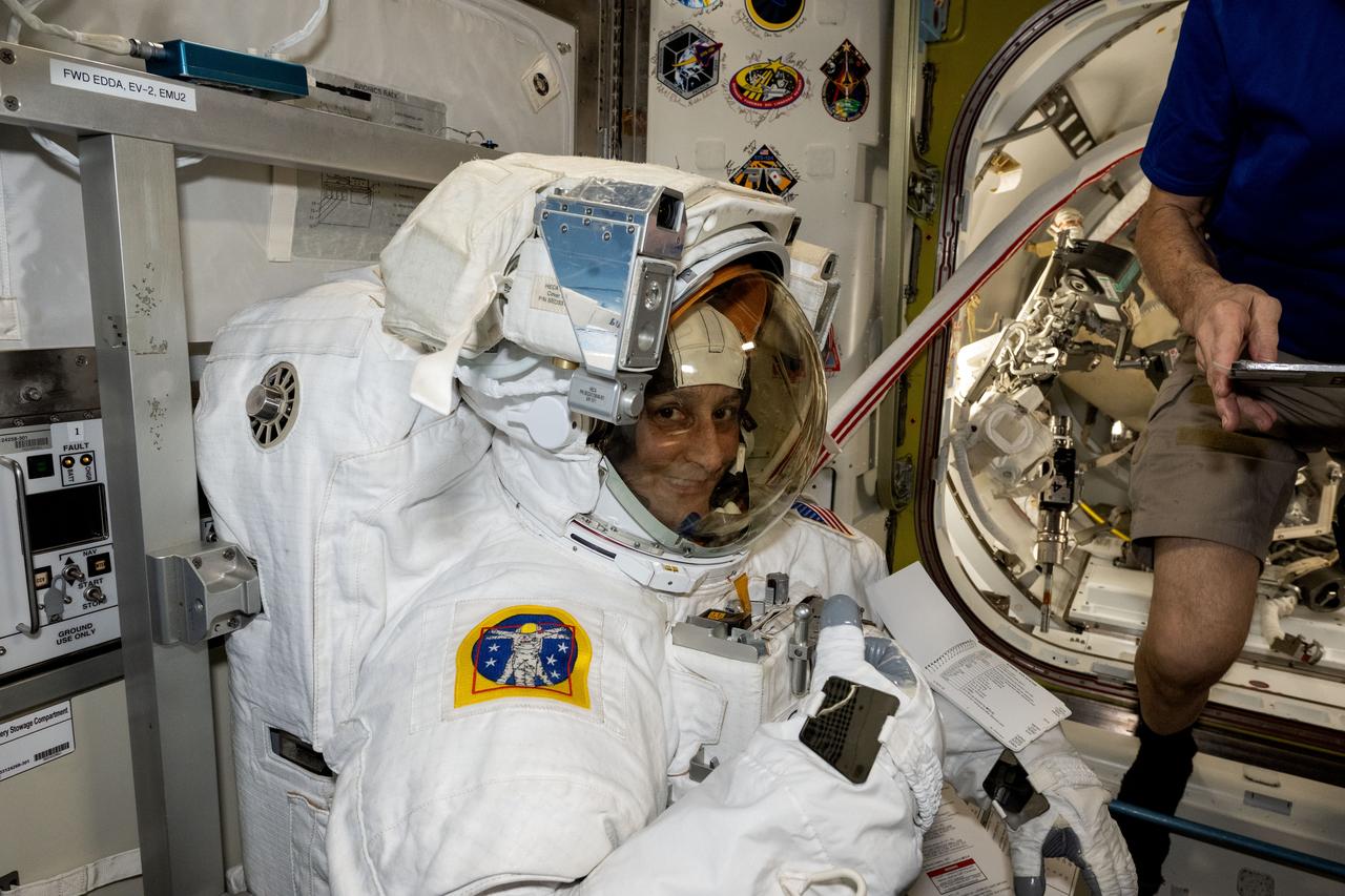 iss072e451674 (Jan. 9, 2025) --- NASA astronaut and Expedition 72 Commander Suni Williams is pictured as she tries on and evaluates her spacesuit in a pressurized configuration aboard the International Space Station's Quest airlock.