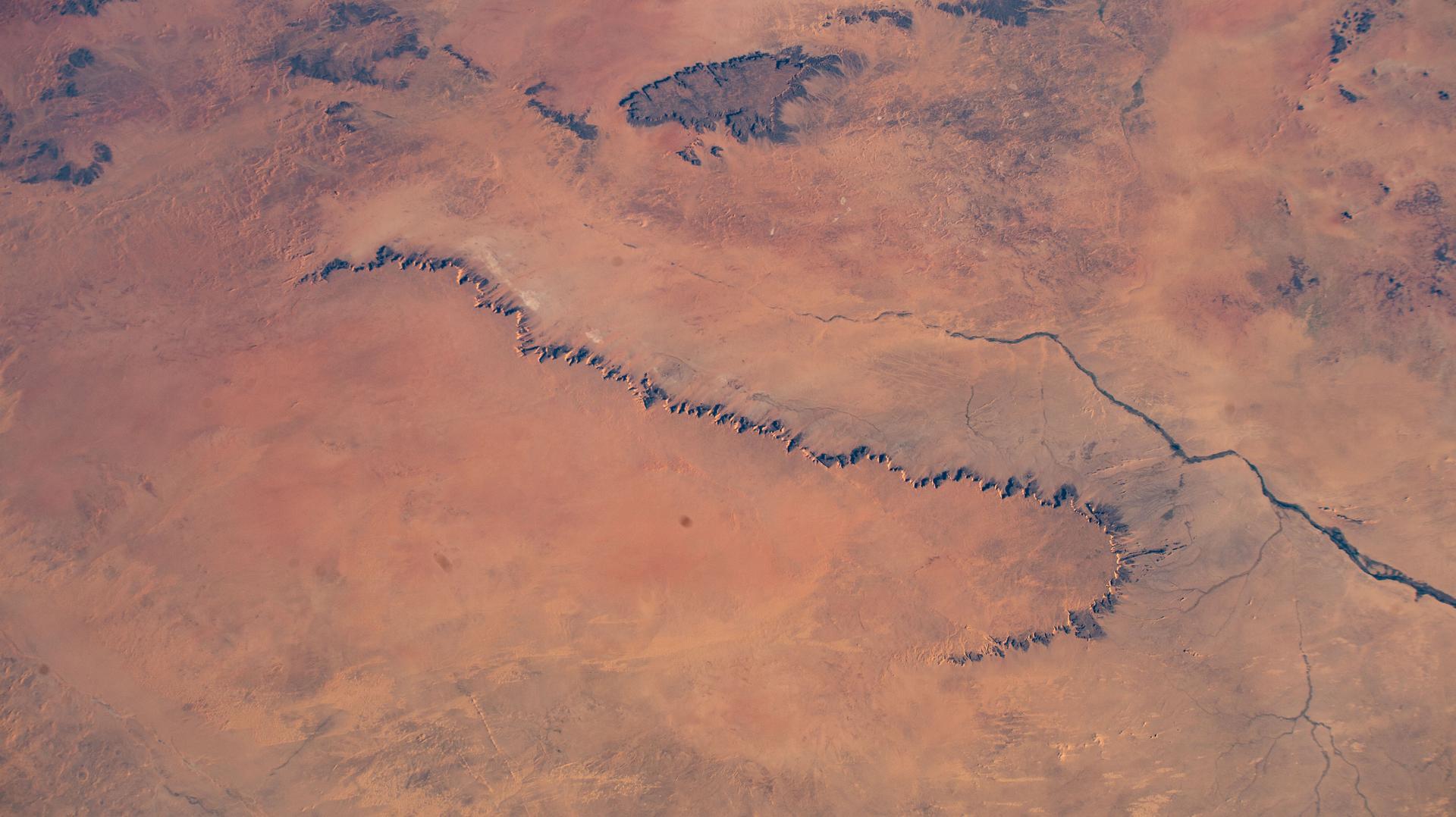 A portion of the Libyan Desert near the Northern Sudan city of Al Dabbah, on the bank of Nile River, is pictured from the International Space Station as it orbited 259 miles above the African nation.