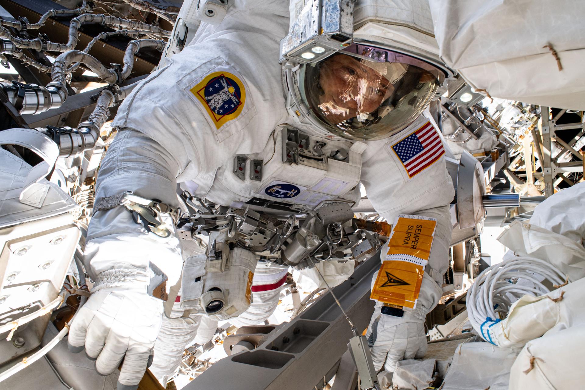 NASA astronaut and Expedition 72 Flight Engineer Nick Hague is pictured during a six-hour spacewalk for science and maintenance on the International Space Station.
