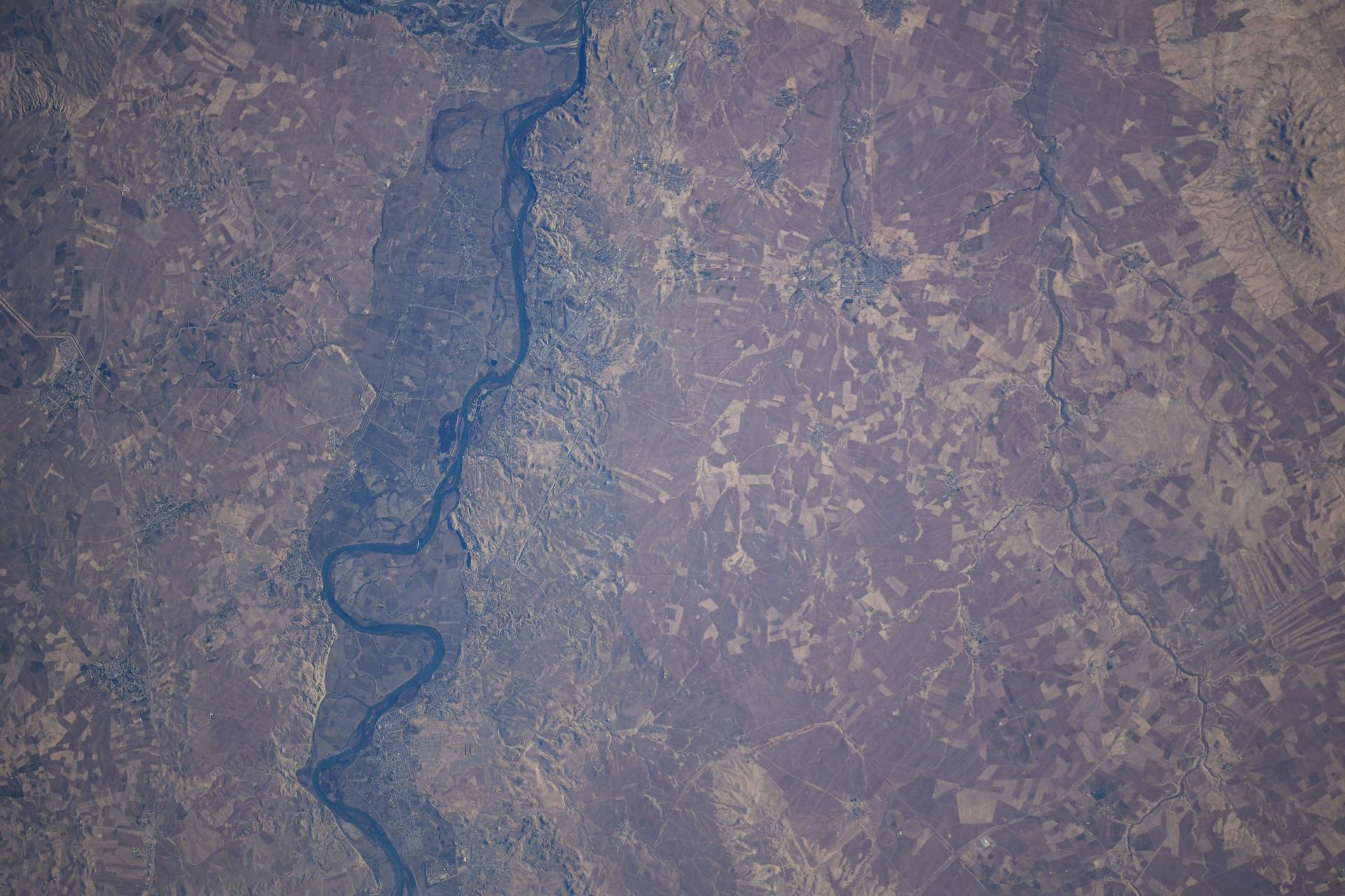 The Tigris River flows through the temperate landscape of northern Iraq in this photograph from the International Space Station as it orbited 260 miles above.