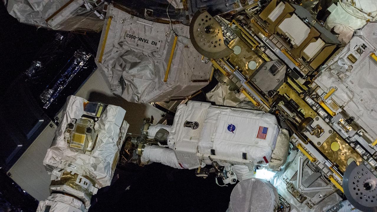 iss072e574847 (Jan. 30, 2025) --- NASA astronaut and Expedition 72 Commander Suni Williams works outside the International Space Station during a five-hour and 26-minute spacewalk to remove and stow a radio frequency group antenna assembly. In the left foreground, is the latching end effector of the Canadarm2 robotic arm. The orbital outpost was soaring 267 miles above New Zealand at the time of this photograph.