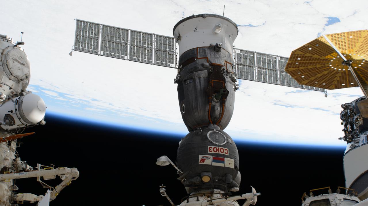 iss072e576564 (Feb. 2, 2025) --- The Soyuz MS-26 crew ship that launched NASA astronaut Don Pettit and Roscosmos cosmonauts Alexey Ovchinin and Ivan Vagner to the International Space Station is pictured docked to the Rassvet module. At right, is a portion of the Northrop Grumman Cygnus resupply ship. At left, is the partially obscured Pirs docking compartment.