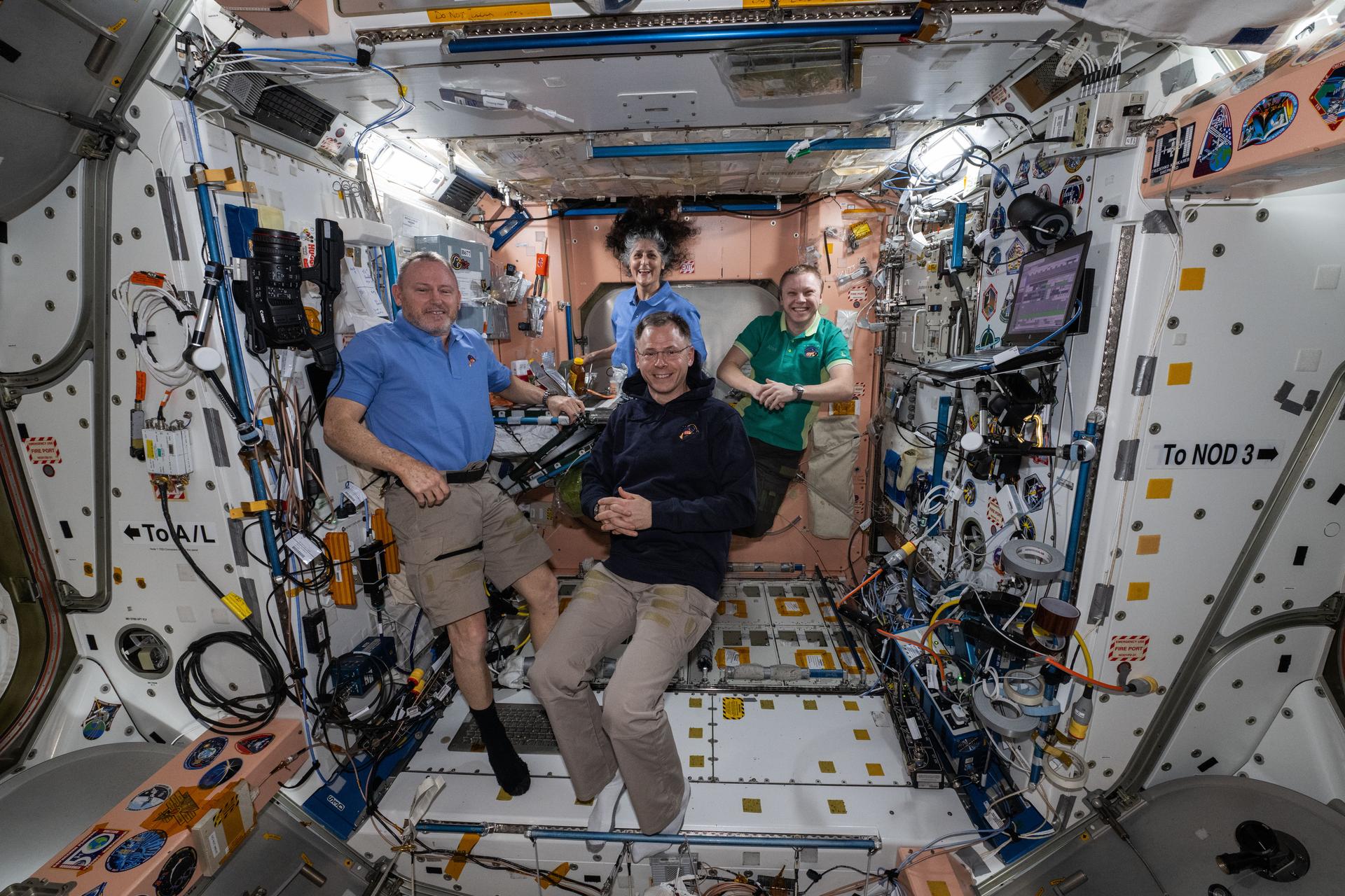 NASA's SpaceX Crew-9 members pose together for a portrait inside the International Space Station's Unity module. Clockwise from left, are NASA astronauts Butch Wimore and Suni Williams, Roscosmos cosmonaut Aleksandr Gorbunov, and NASA astronaut Nick Hague.