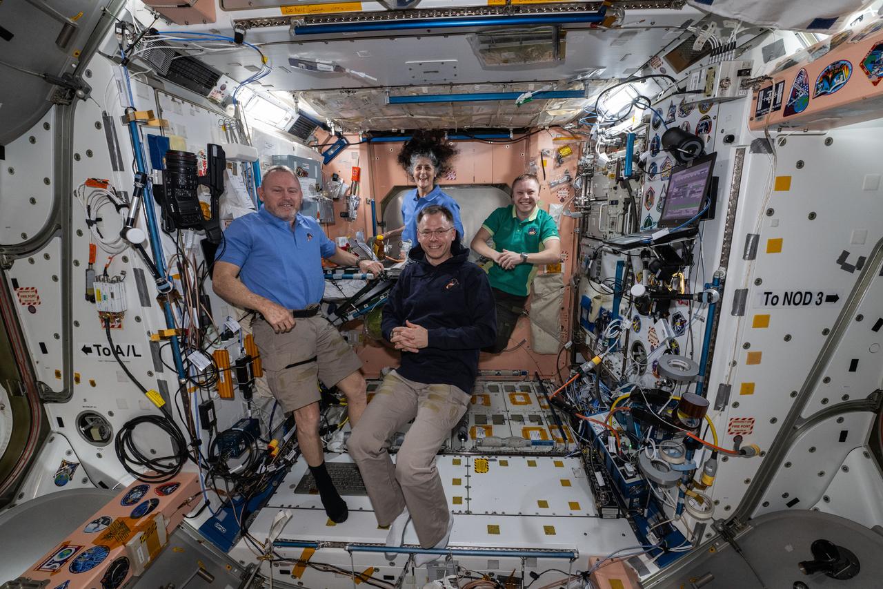 iss072e645379 (Feb. 19, 2025) --- NASA's SpaceX Crew-9 members pose together for portrait inside the International Space Station's Unity module. Clockwise from left, are NASA astronauts Butch Wimore and Suni Williams, Roscosmos cosmonaut Aleksandr Gorbunov, and NASA astronaut Nick Hague.