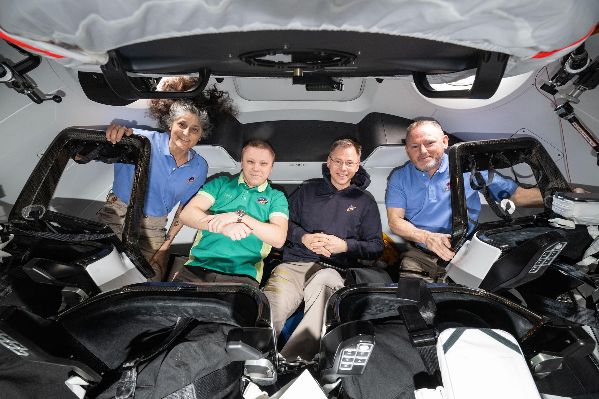 NASA's SpaceX Crew-9 members pose together for a portrait inside the SpaceX Dragon crew spacecraft docked to the International Space Station. From left, are NASA astronaut Suni Williams, Roscosmos cosmonaut Aleksandr Gorbunov, and NASA astronauts Nick Hague and Butch Wimore.