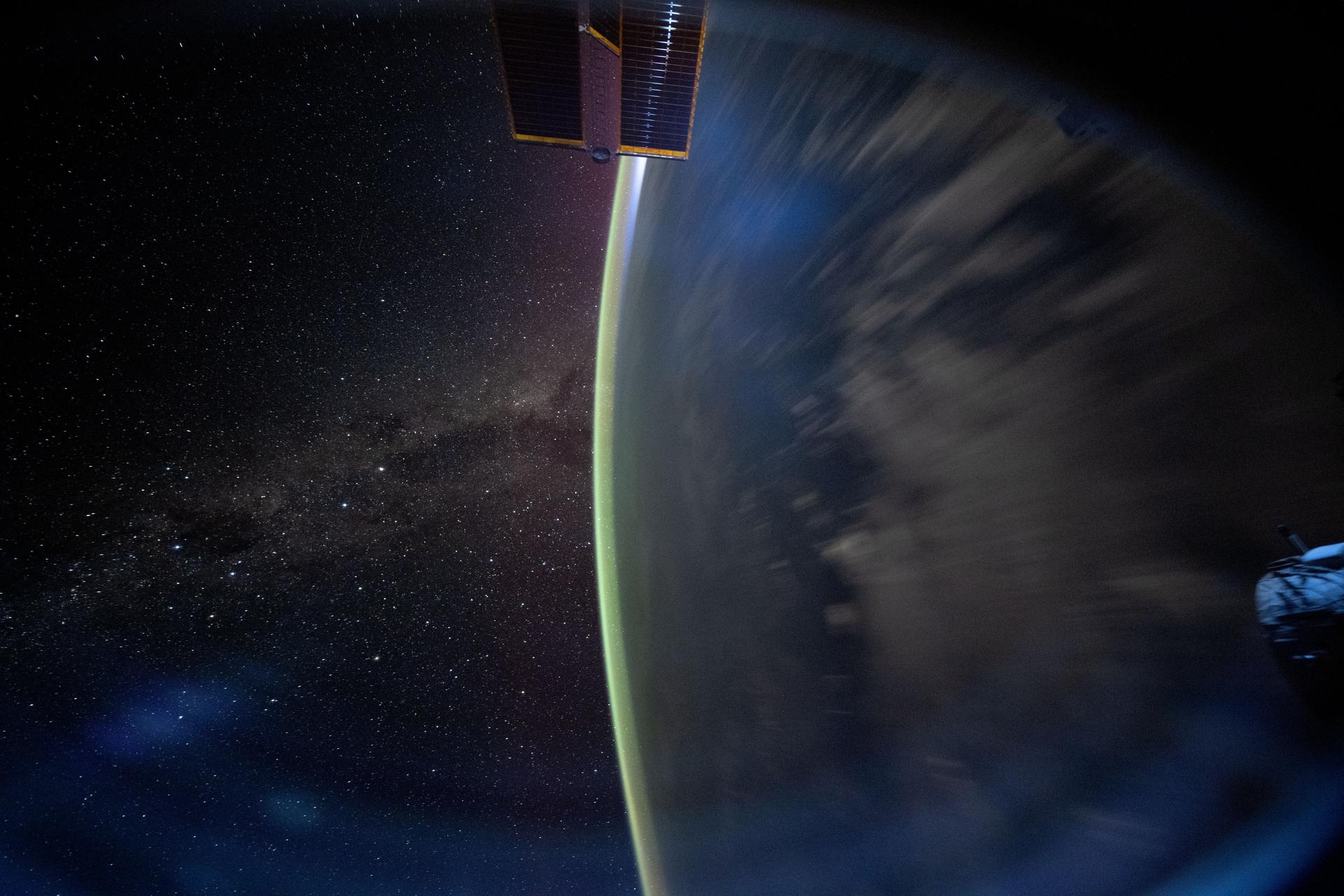 NASA astronaut and Expedition 72 Flight Engineer Don Pettit poses for a portrait inside the International Space Station's Kibo laboratory module. Attached to Pettit's legs are a notebook and a variety of tools used for research and maintenance operations aboard the orbital outpost.