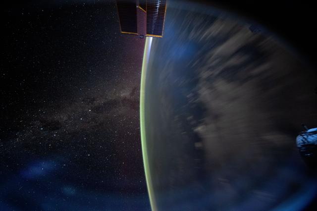 NASA image: The Milky Way appears beyond Earth's horizon