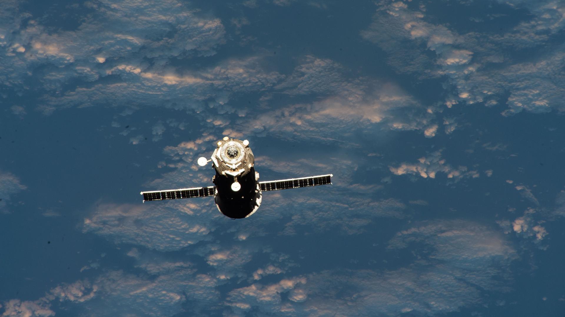 The Roscosmos Progress 89 cargo craft departs the vicinity of the International Space Station after undocking from the orbital outpost's Zvezda service module.