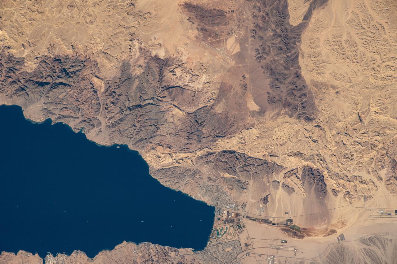 iss072e660964 (Feb. 24, 2025) --- The northernmost tip of the Gulf of Aqaba, which Egypt, Israel, and Jordan border along in this photograph, is pictured from the International Space Station as it orbited 263 miles above the Middle East.