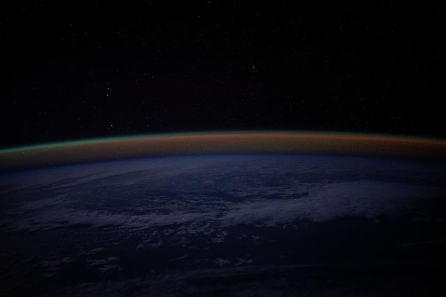 NASA image: An atmospheric glow blankets Earth's horizon