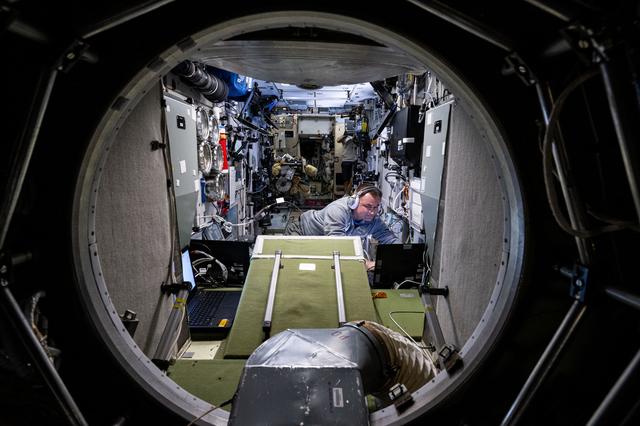 NASA image: Cosmonaut Alexey Ovchinin works inside the Zvezda service module