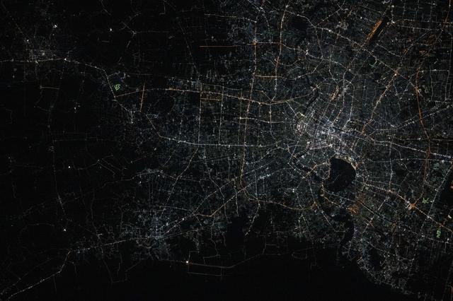 NASA image: Bangkok, Thailand—split by the Chao Phraya river