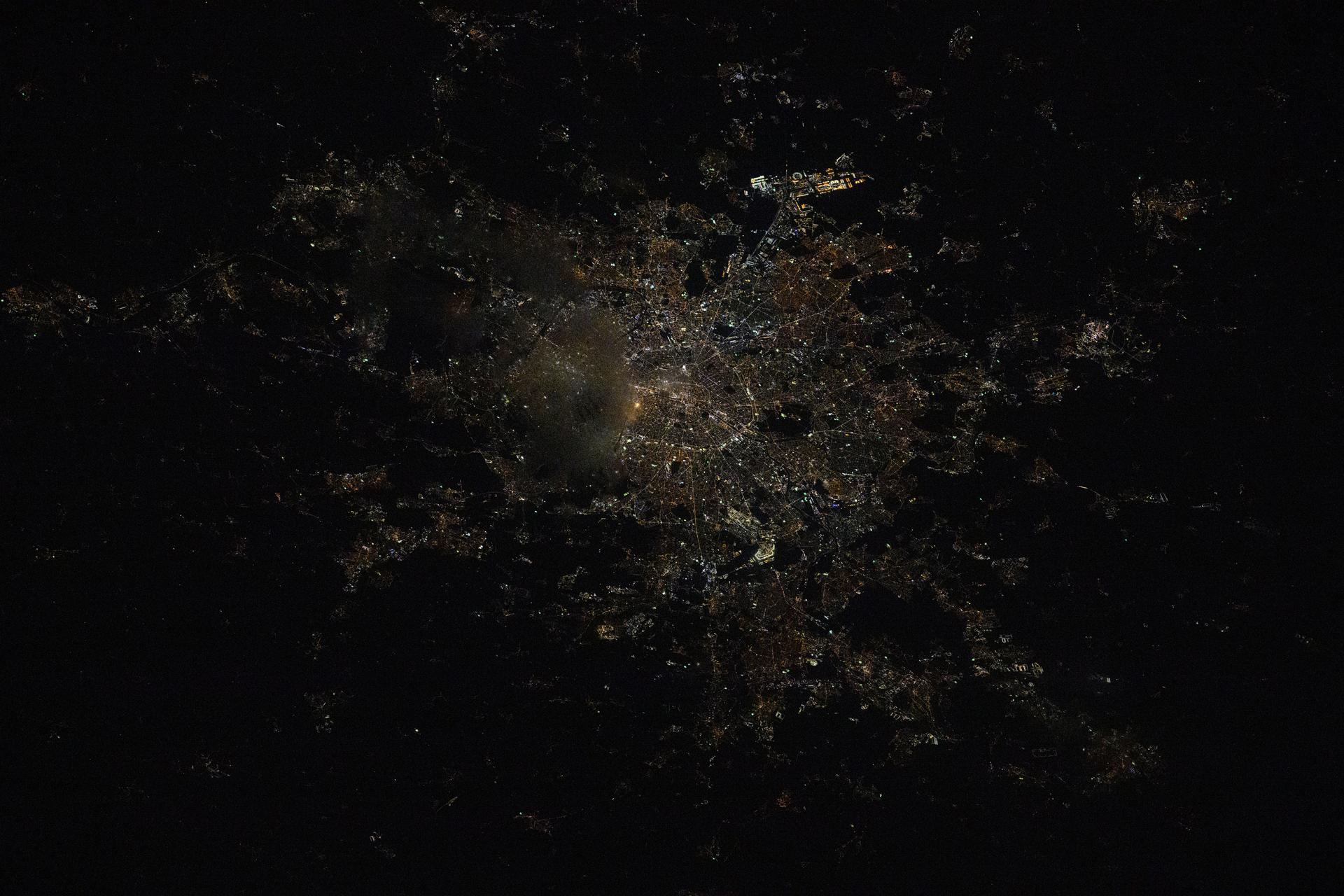 Paris, also known as the "City of Lights" and France's capital and largest city with a population of about 2.05 million, is pictured at approximately 9:54 p.m. local time from the International Space Staton as it orbited 261 miles above.
