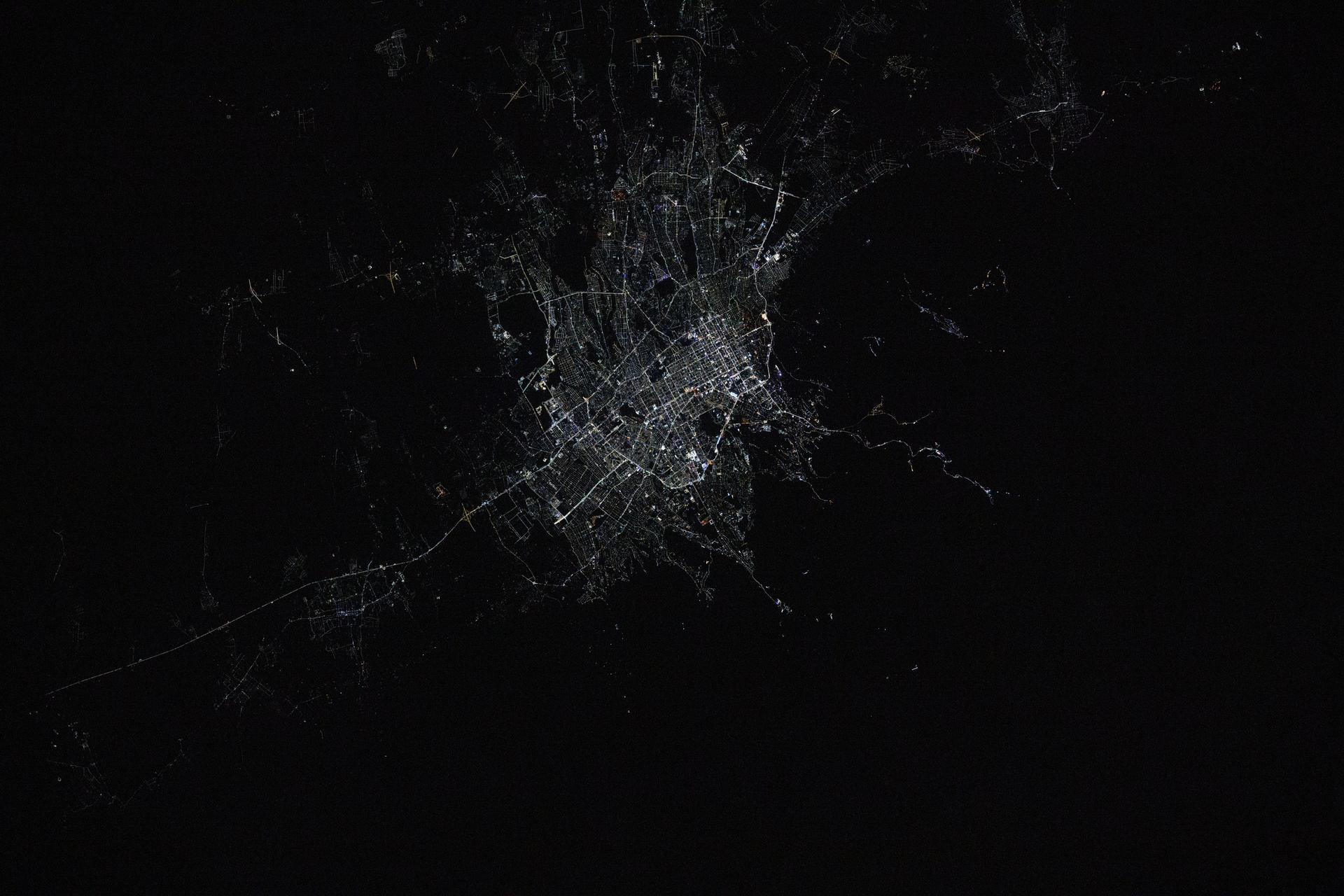 Almaty, Kazakhstan's largest city with a population of about 2.25 million and the second largest city in Central Asia, is pictured at approximately 12:42 a.m. local time from the International Space Station as it orbited 261 miles above.
