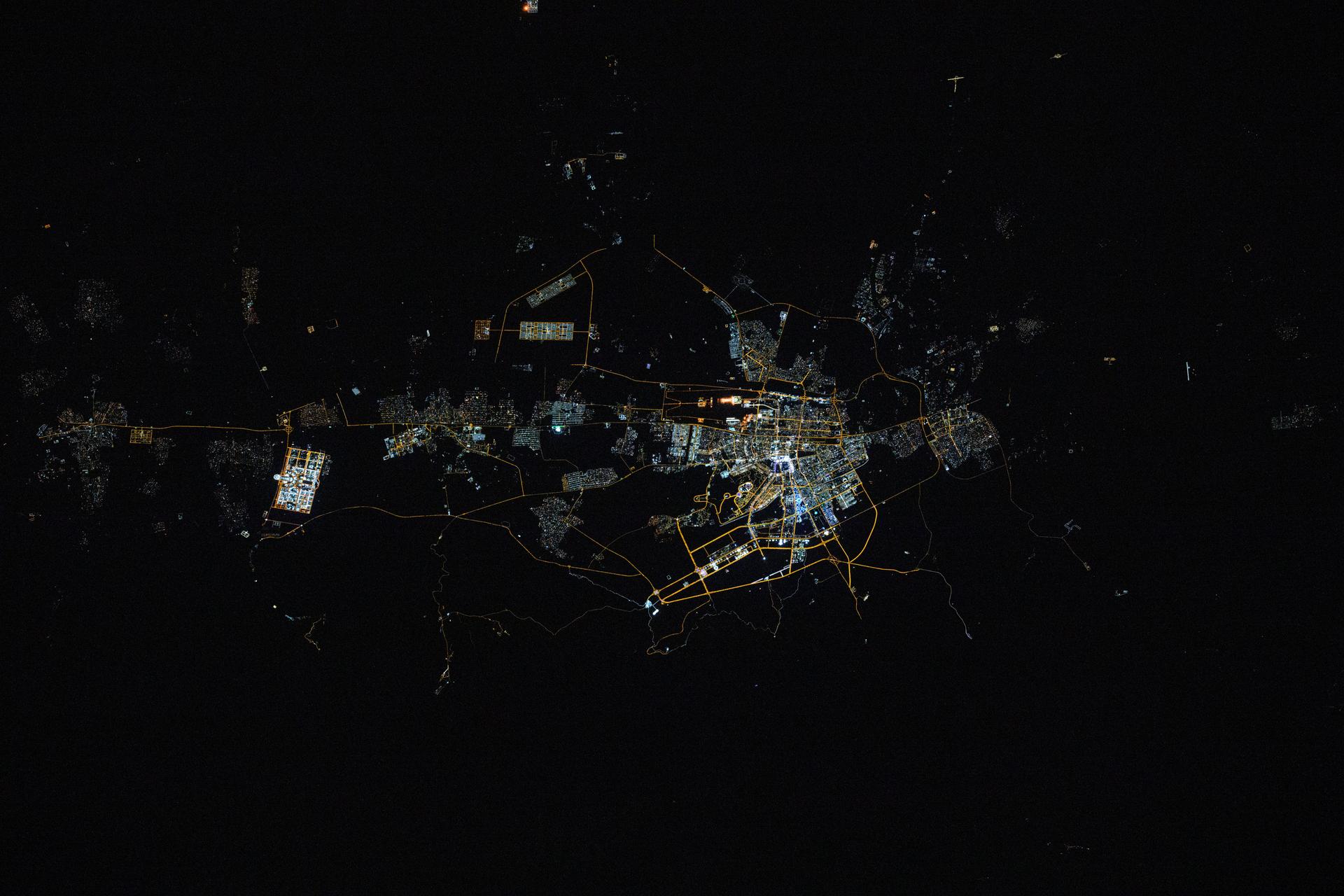 Ashgabat, the capital city of Turkmenistan with a population of about 1 million, is pictured at approximately 1:16 a.m. local time from the International Space Station as it orbited 261 miles above.