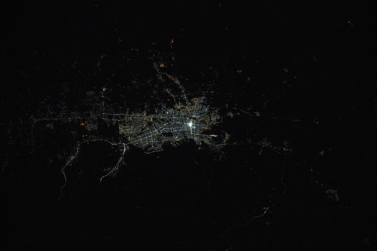 iss072e793149 (March 17, 2025) --- Mashhad, the second-most populous city in Iran with approximately 3.62 million residents near the border with Turkmenistan, is pictured at 11:47 p.m. local time from the International Space Station as it orbited 261 miles above.