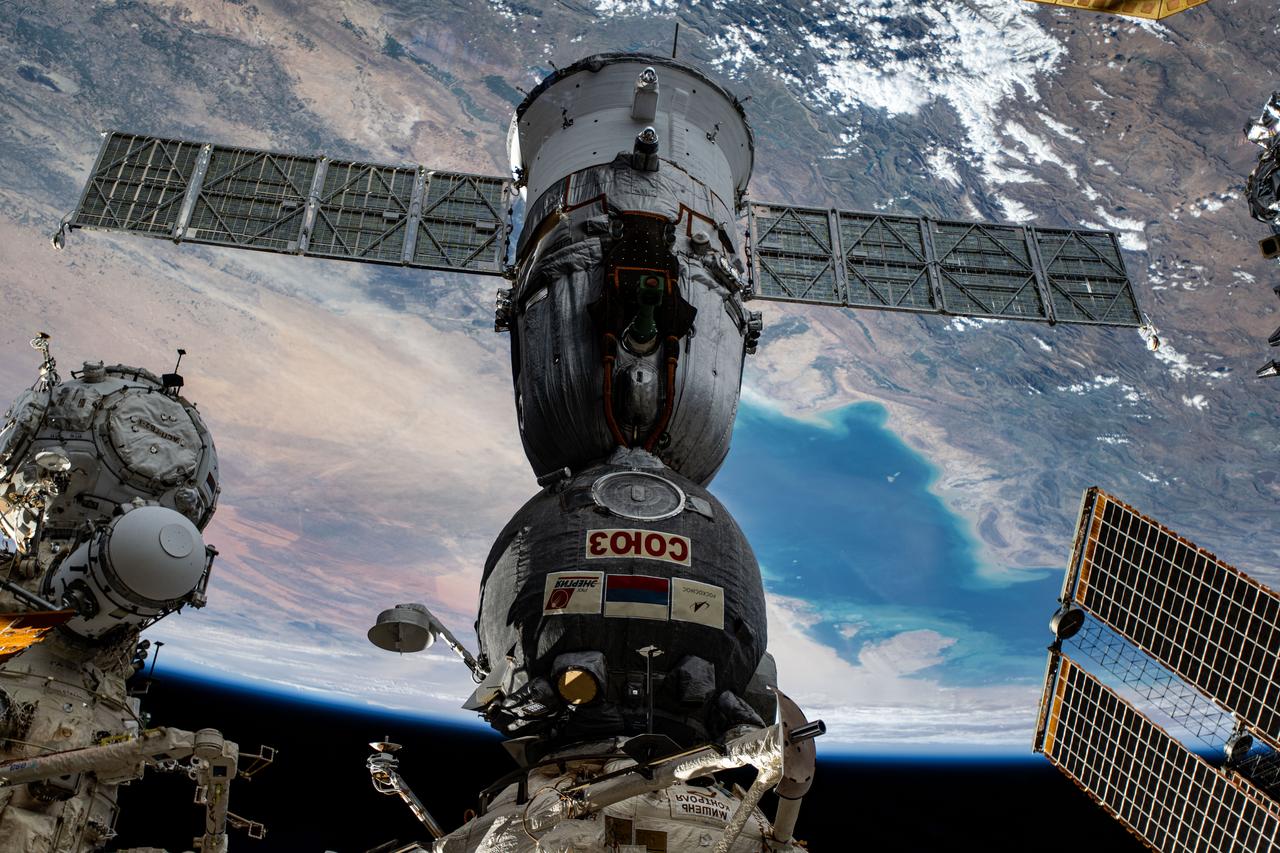 iss072e838101 (March 24, 2025) --- The Soyuz MS-26 spacecraft that launched NASA astronaut Don Pettit and Roscosmos cosmonauts Alexey Ovchinin and Ivan Vagner to the International Space Station is pictured docked to the Rassvet module. The orbiting lab was soaring 260 miles above Turkmenistan near the Caspian Sea.