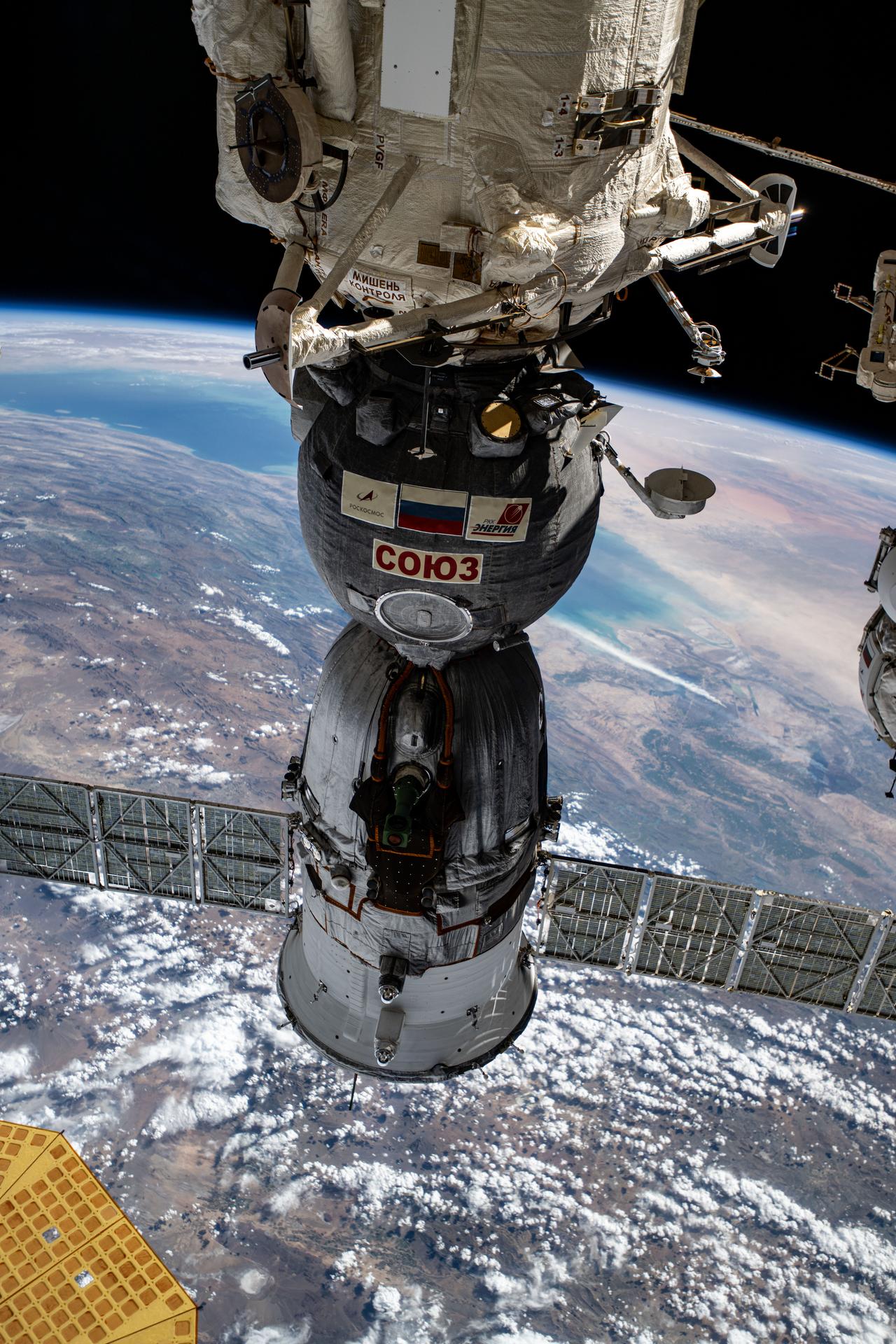 The Soyuz MS-26 spacecraft that launched NASA astronaut Don Pettit and Roscosmos cosmonauts Alexey Ovchinin and Ivan Vagner to the International Space Station is pictured docked to the Rassvet module. The orbiting lab was soaring 260 miles above Turkmenistan near the Caspian Sea.
