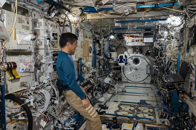 NASA image: Astronaut Takuya Onishi monitors the Japanese Experiment Module Internal Ball Camera 2