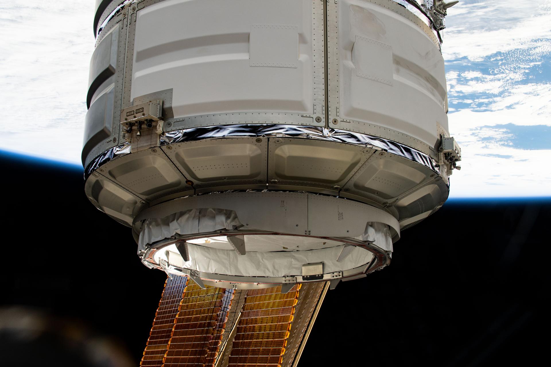 The Cygnus space freighter's common berthing mechanism, which connects Cygnus to the International Space Station, is pictured after the Canadarm2 robotic arm removed the cargo craft from the Unity module's Earth-facing port.