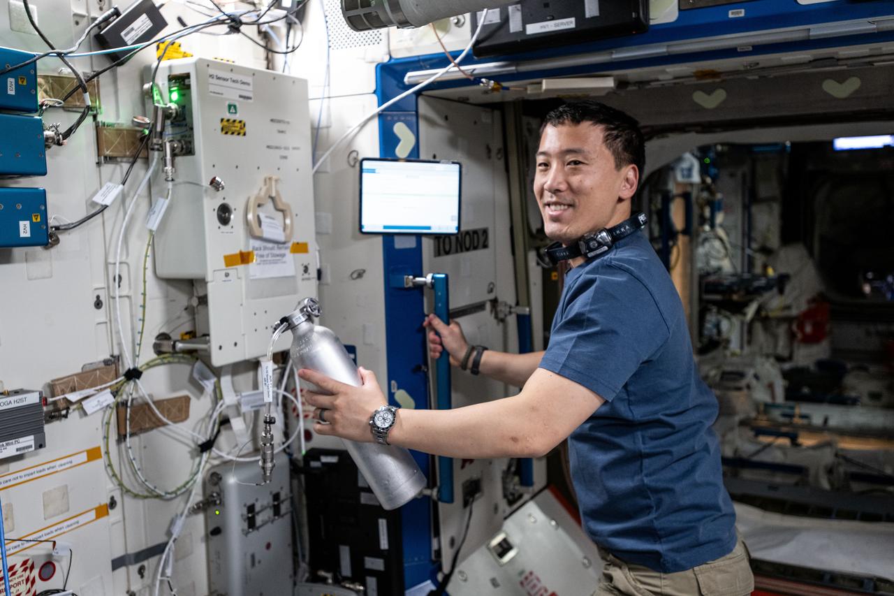 iss072e941773 (April 9, 2025) --- NASA astronaut and Expedition 72 Flight Engineer Jonny Kim installs experimental hydrogen sensors to test the advanced life support gear for longer calibration life and improved reliability aboard the International Space Station's Destiny laboratory module.