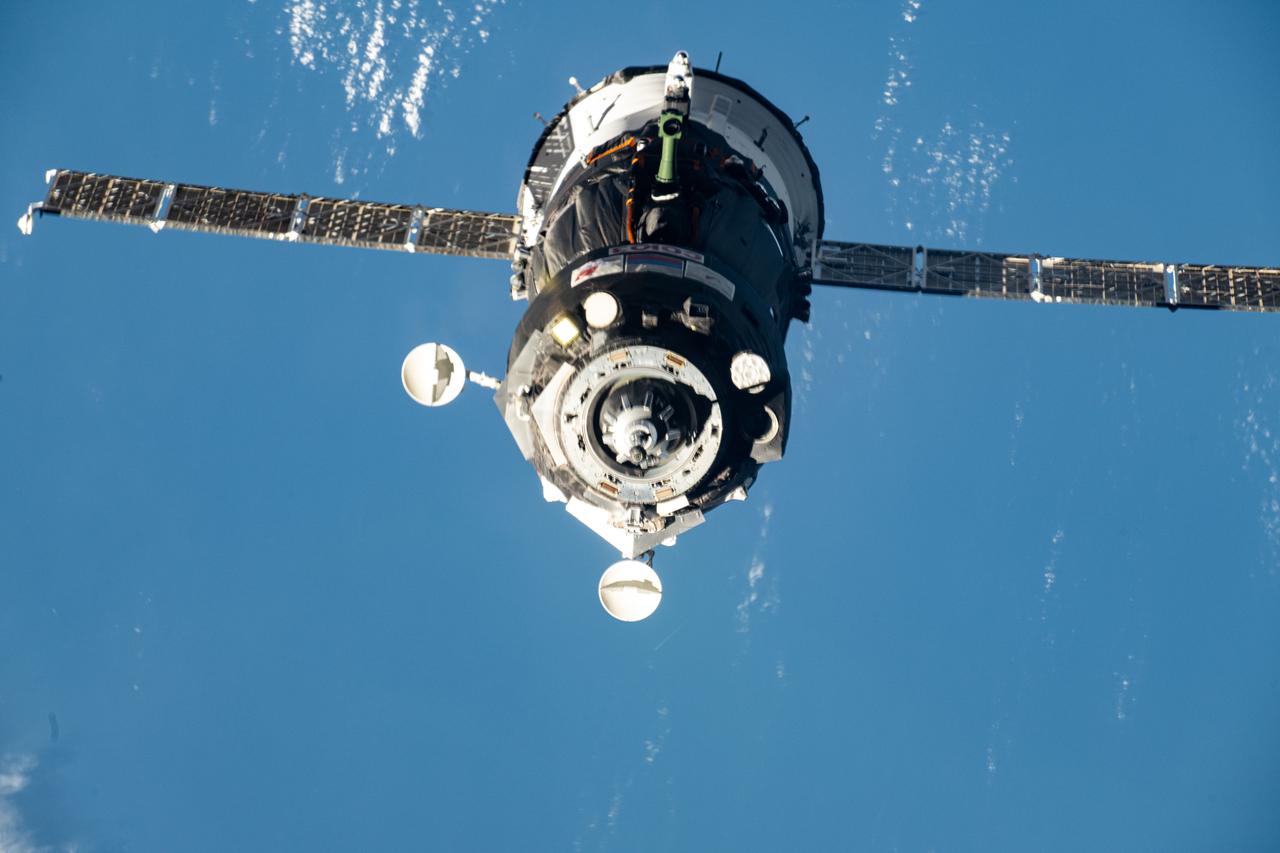 iss072e999938 (April 8, 2025) --- The Soyuz MS-27 spacecraft approaches the International Space Station carrying NASA astronaut Jonny Kim and Roscosmos cosmonauts Sergey Ryzhikov and Alexey Zubritsky. Both spacecraft were orbiting 261 miles above the Mediterranean Sea near Italy's island of Sardegna at the time of this photograph.