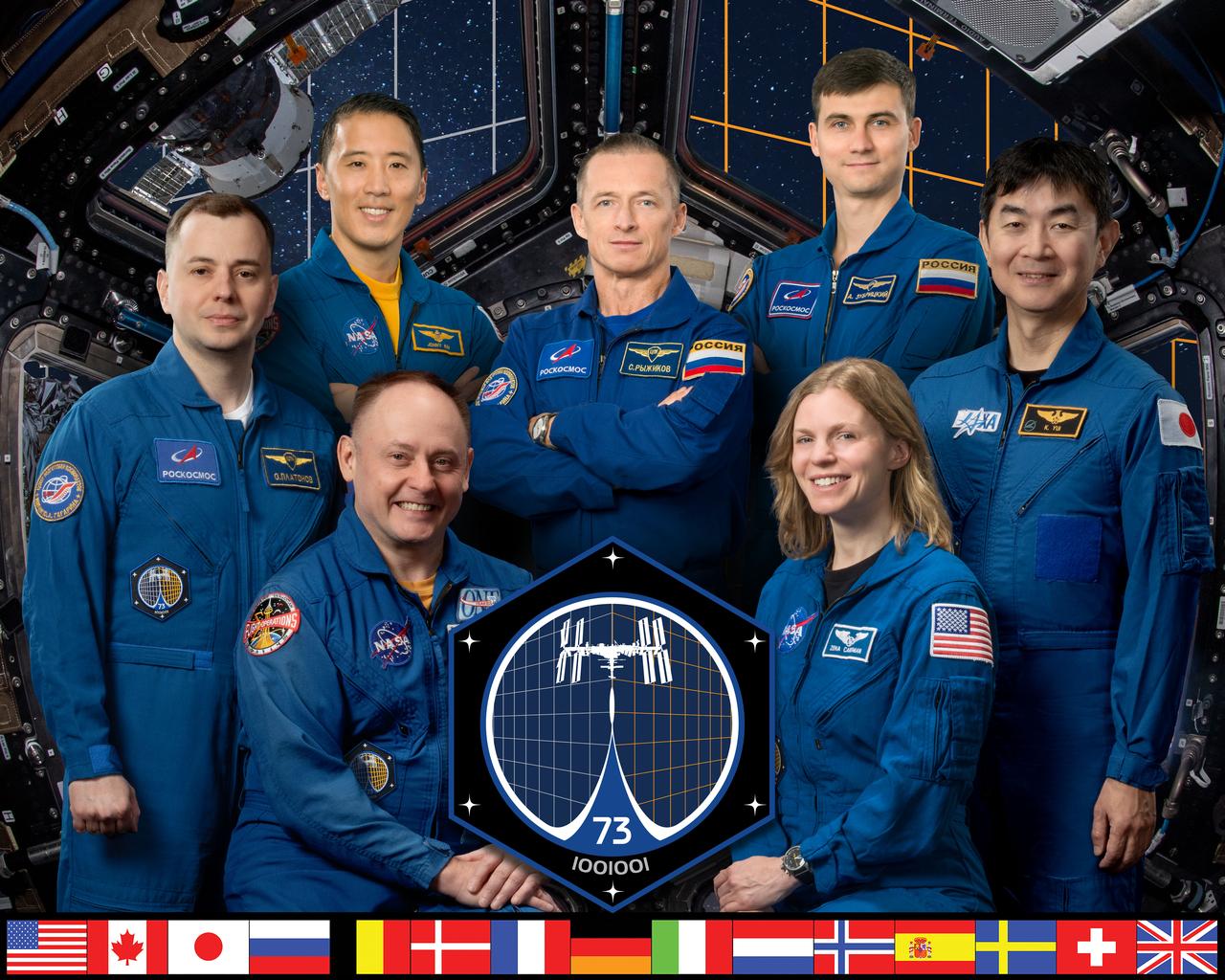iss073-s-002b (Oct. 16, 2024) --- The updated official portrait of the International Space Station's seven-member Expedition 73 crew from three different space agencies. Seated in the front row are NASA astronauts Mike Fincke and Zena Cardman. In the back row from left are, Roscosmos cosmonaut Oleg Platonov; NASA astronaut Jonny Kim; Roscosmos cosmonauts Sergey Ryzhikov and Alexey Zubritsky; and JAXA (Japan Aerospace Exploration Agency) astronaut Kimiya Yui. Credit: NASA/Josh Valcarcel