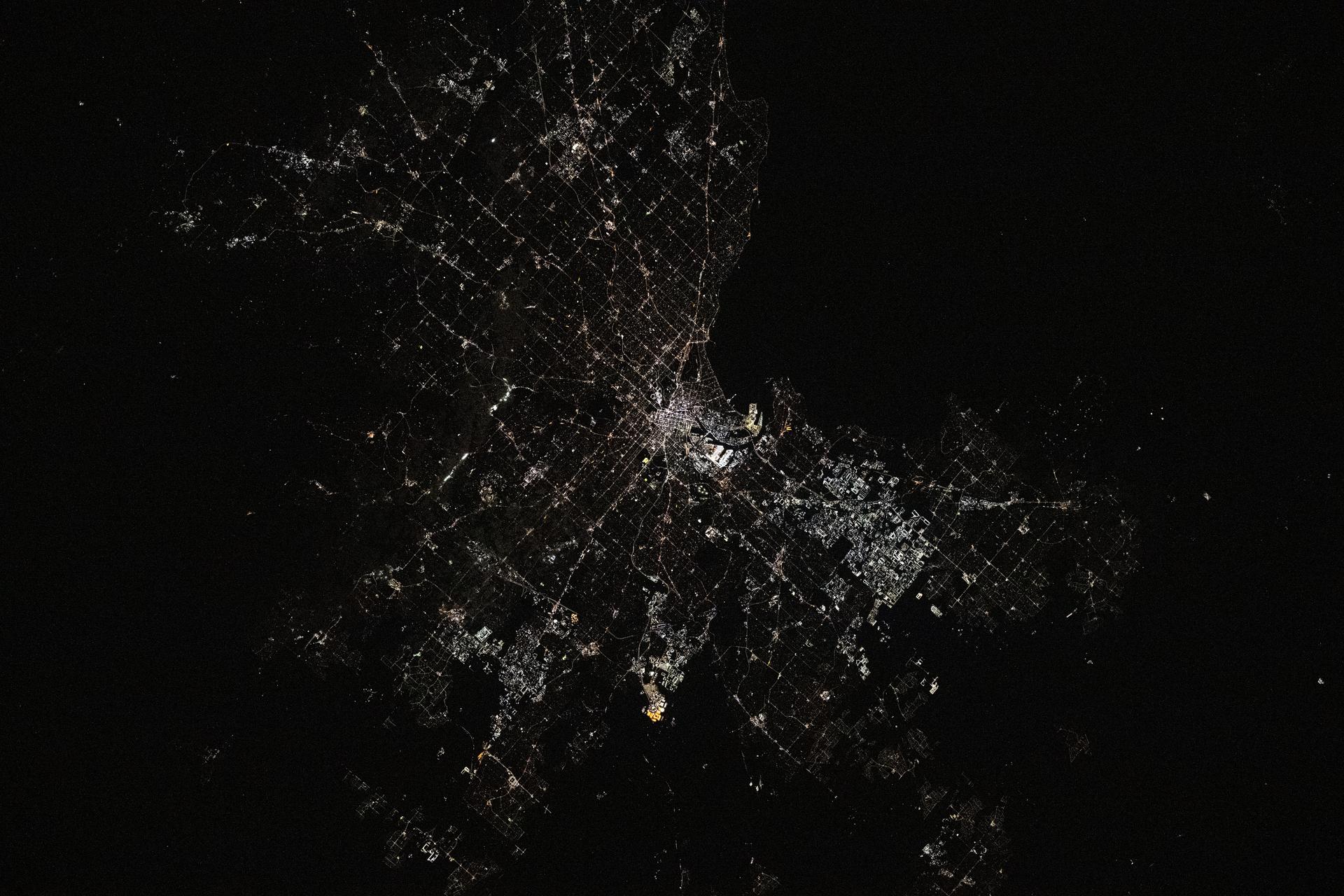 Melbourne, the capital of Australia's state of Victoria with a population of about 5.2 million, is pictured at approximately 10:07 p.m. local time from the International Space Station as it orbited 267 miles above the continental nation.