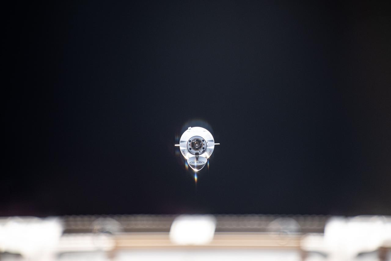 iss073e0001147 (April 22, 2025) --- The SpaceX Dragon cargo craft, with its nosecone open, approaches the International Space Station for an automated docking to the Harmony module's space-facing port. Dragon delivered about 6,700 pounds of new science experiments and crew supplies replenishing the Expedition 73 crew.