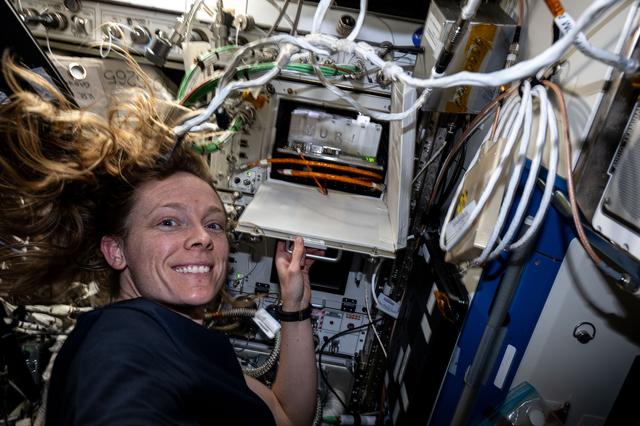 NASA image: Astronaut Nichole Ayers shows off biology research hardware