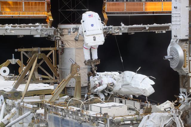 NASA image: NASA astronauts Anne McClain and Nichole Ayers are pictured during a spacewalk