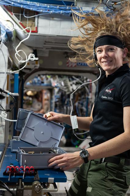 NASA image: NASA astronaut Nichole Ayers swaps physical science and crystalization research hardware