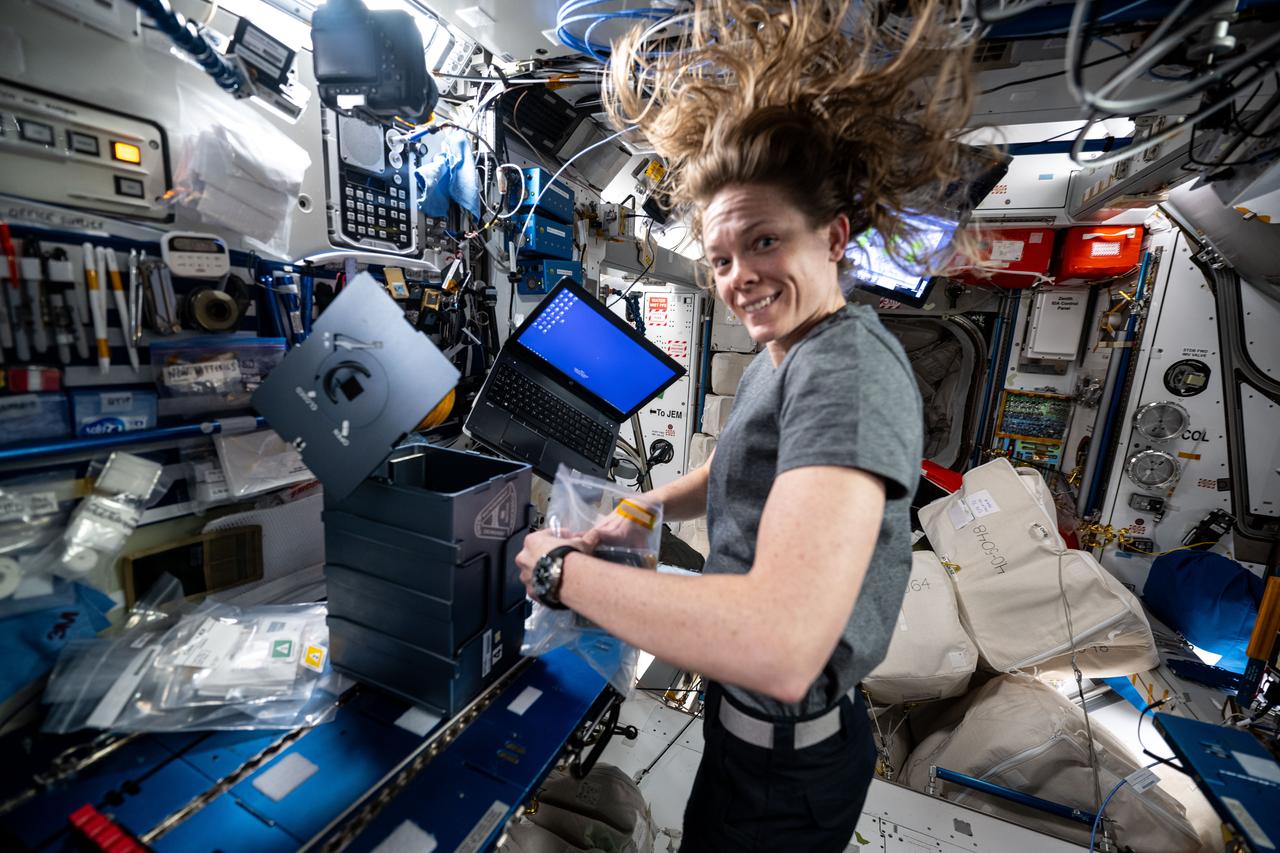 iss073e0030873 (May 14, 2025) --- NASA astronaut and Expedition 73 Flight Engineer Nichole Ayers swaps hardware that promotes physical science and crystalization research inside the Advanced Space Experiment Processor-4 (ADSEP-4) aboard the International Space Station. The ADSEP-4 is supporting a technology demonstration potentially enabling the synthesis of medications during deep space missions and improving the pharmaceutical industry on Earth.