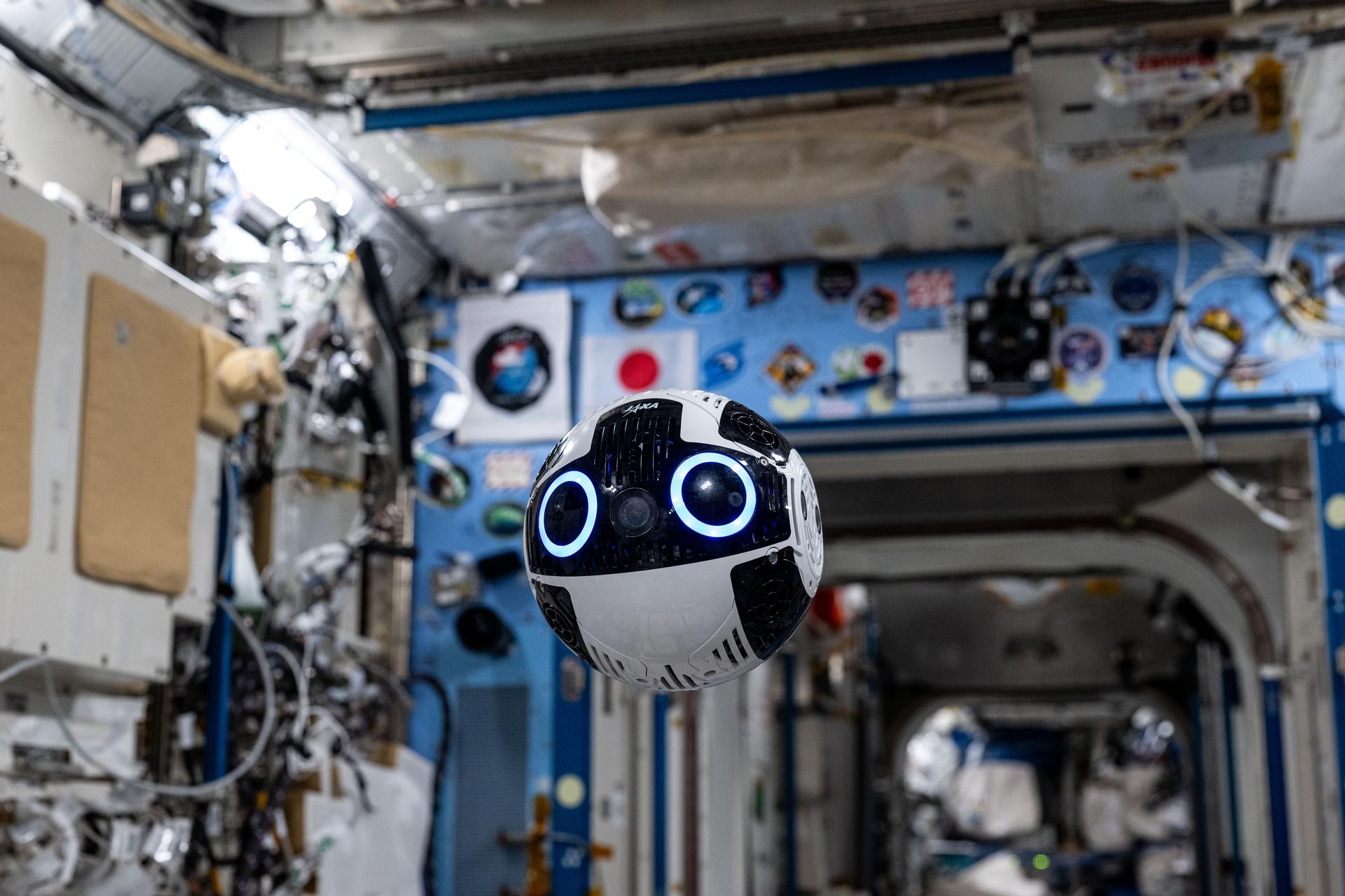 The Japanese Experiment Module Internal Ball Camera 2 tests the automation of capturing photographs and videos of crew activities aboard the International Space Station's Kibo laboratory module. The spherical, free-flying robotic camera may enable more crew time for important duties such as microgravity research. Credit: JAXA/Takuya Onishi
