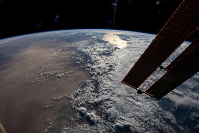 NASA image: The sun's glint beams off the Strait of Gibraltar
