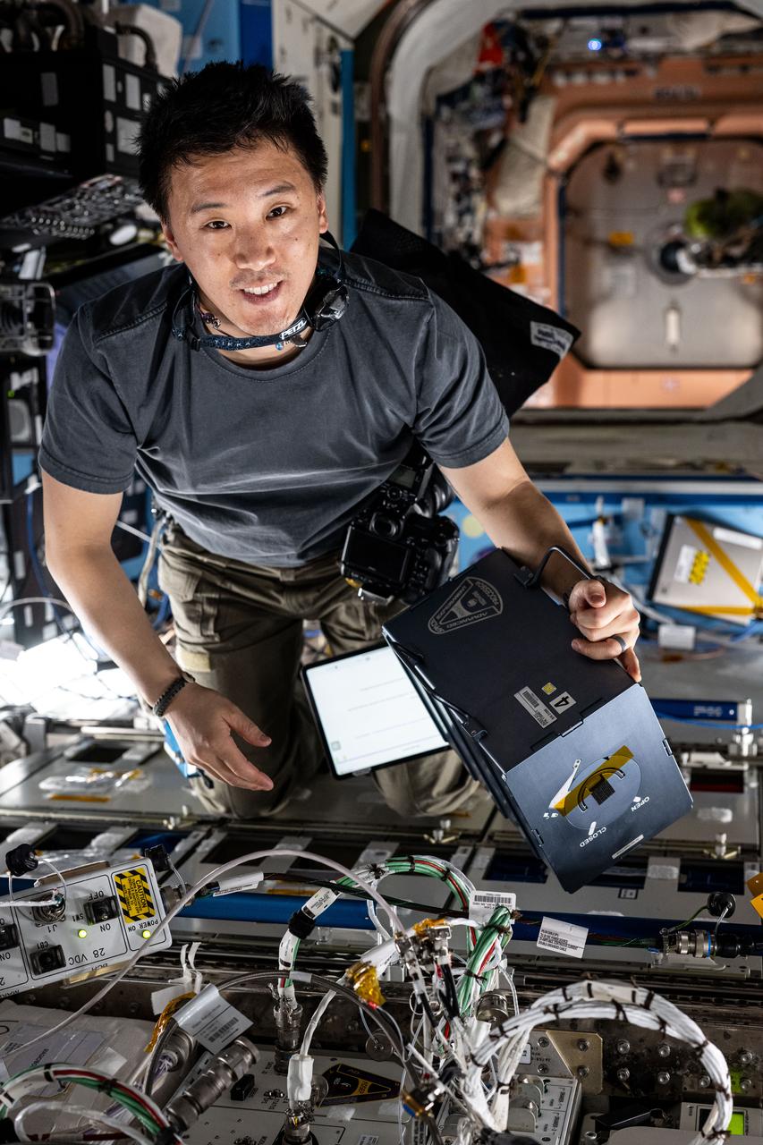 iss073e0032794 (May 16, 2025) --- NASA astronaut and Expedition 73 Flight Engineer Jonny Kim swaps hardware that promotes physical science and crystalization research inside the Advanced Space Experiment Processor-4 (ADSEP-4) aboard the International Space Station. The ADSEP-4 is supporting a technology demonstration potentially enabling the synthesis of medications during deep space missions and improving the pharmaceutical industry on Earth.