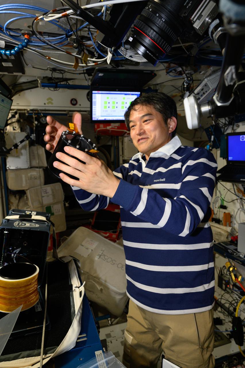 iss073e0033654 (May 19, 2025) --- JAXA (Japan Aerospace Exploration Agency) astronaut and Expedition 73 Commander Takuya Onishi services hardware that promotes physical science and crystalization research inside the Advanced Space Experiment Processor-4 (ADSEP-4) aboard the International Space Station. The ADSEP-4 is supporting a technology demonstration potentially enabling the synthesis of medications during deep space missions and improving the pharmaceutical industry on Earth.