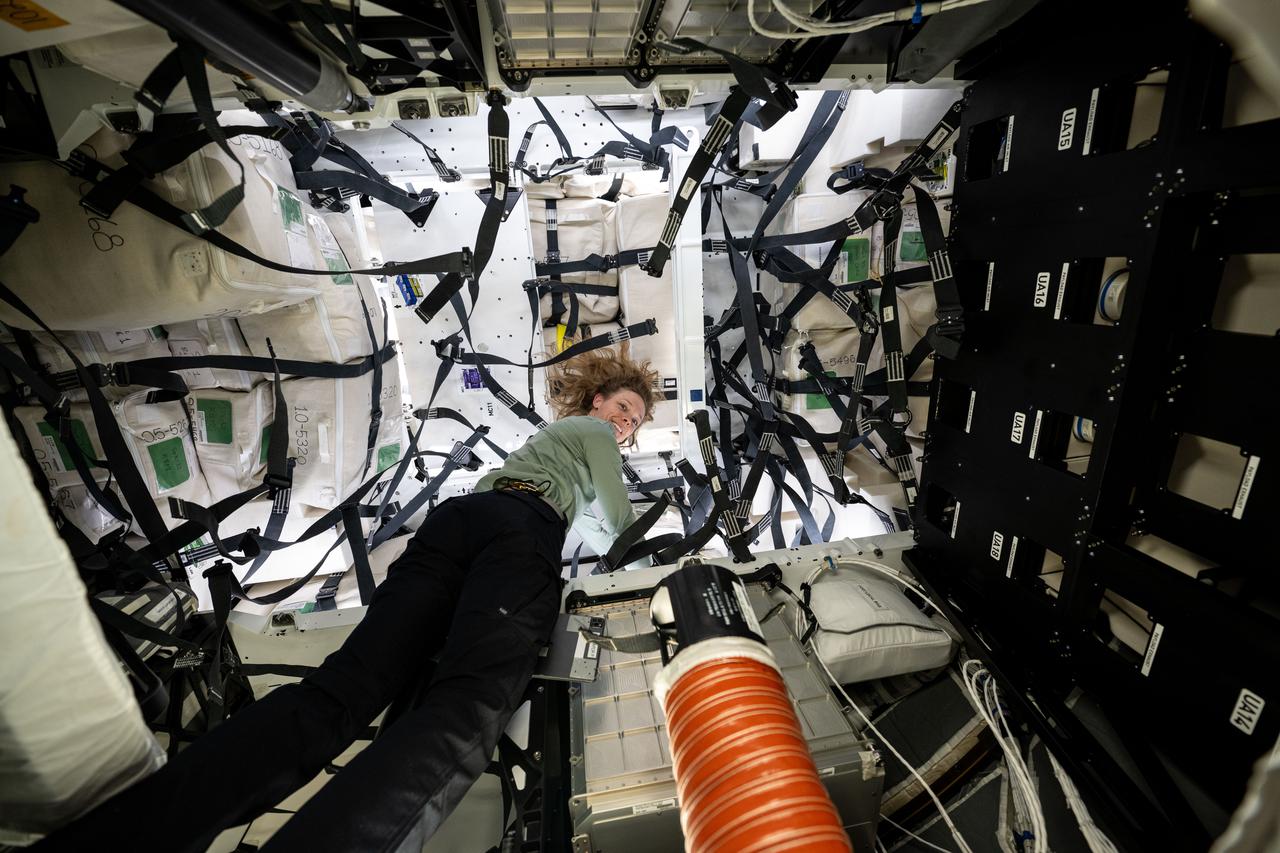 iss073e0071511 (May 15, 2025) --- NASA astronaut and Expedition 73 Flight Engineer Nichole Ayers works inside the SpaceX Dragon cargo spacecraft readying the vehicle to be packed with completed science experiments, time-critical research samples, and International Space Station hardware before its departure.
